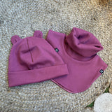 Cepure ar austiņām un šalli